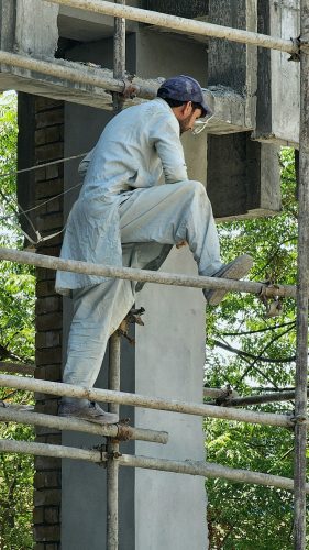 Labour working on building construction FREE STOCK IMAGE PAKISTAN