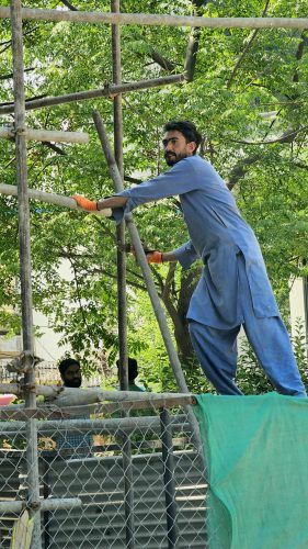 Labour working on building construction FREE STOCK IMAGE PAKISTAN